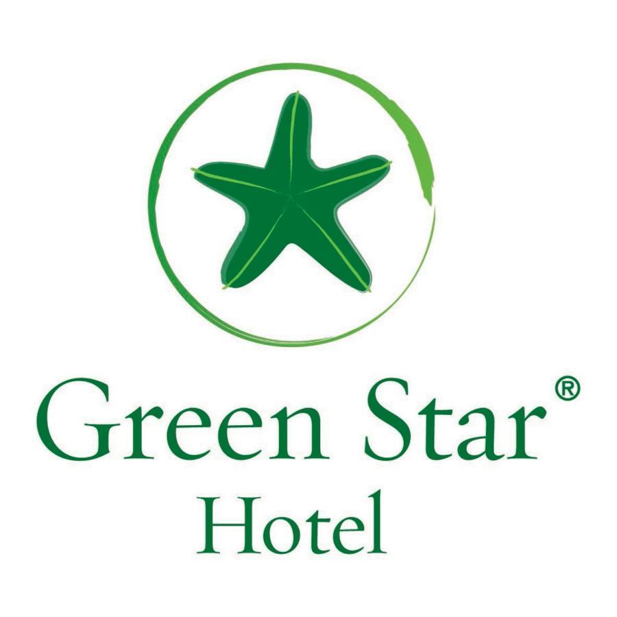 Safir Hotel Cairo Giza Ngoại thất bức ảnh The image shows the logo of "Green Star Hotel." It features a green star, likely a stylized sea star, positioned above the text. The name "Green Star" is displayed prominently, with "Hotel" underneath it, all in a clean and simple font. The overall d
